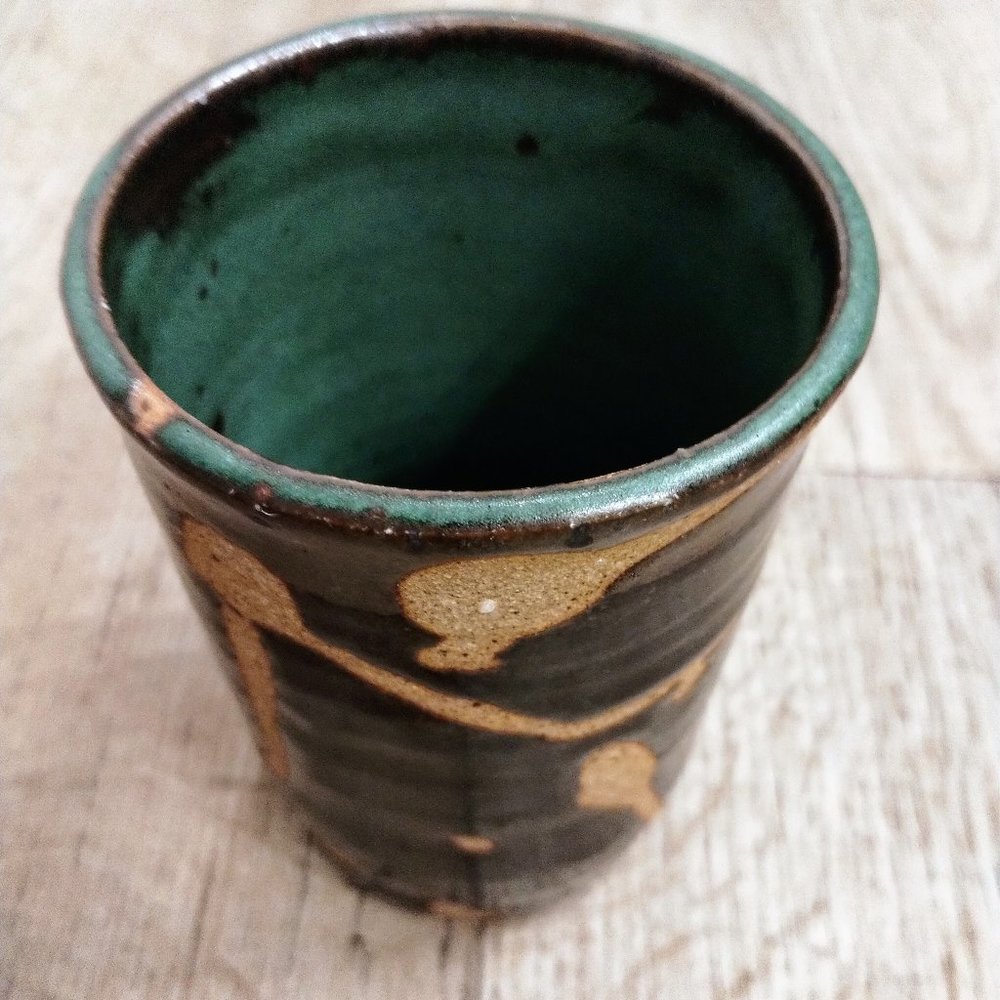 Handcrafted Art Pottery Brown drip glaze with raw pottery exposed throughout.